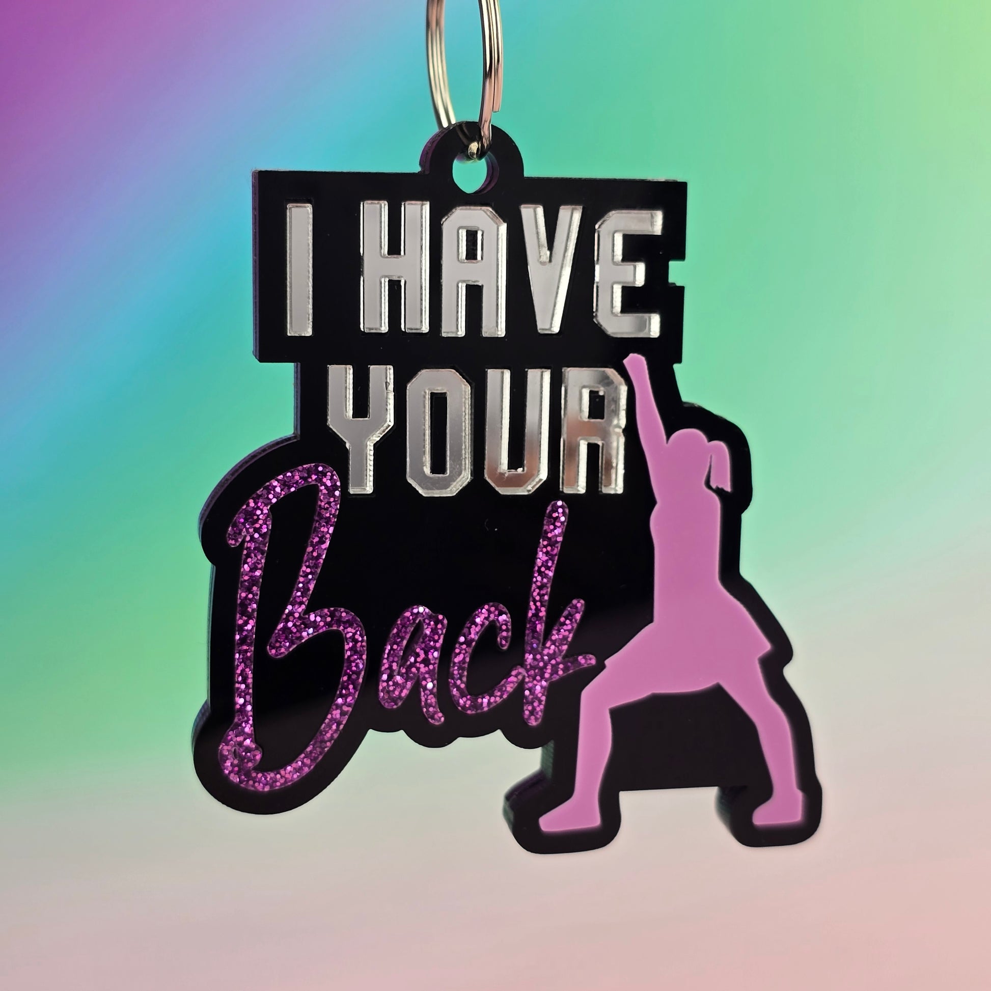 Keychain with a Cheerleader silhouette and text 'I have your back' on a colorful gradient background